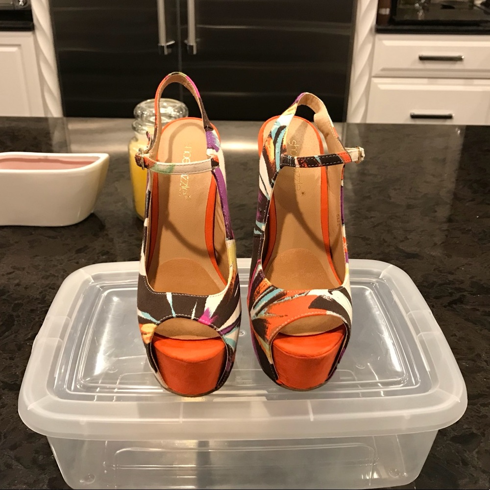 Orange with florals heels.
